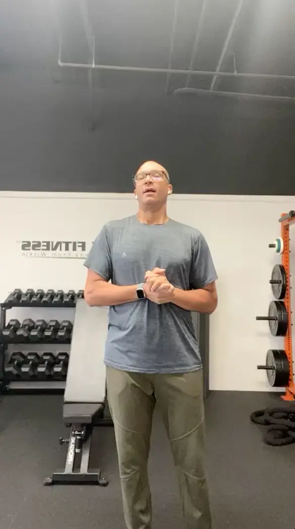 Instructor explaining true body balance principles to a group